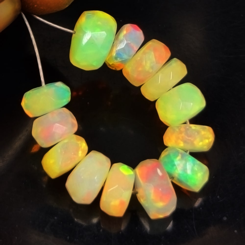 7.34 Ct Natural Multicolor Welo Opal Flash Fire Round Beads: Weight - 7.34 Ct / Dimensions - 5.20 - 6.70 mm / 13 Pc's / Shape & Cut - Drilled Round Beads / Color - Multicolor / Transparency - Translucent / Origin - Ethiopia / Comments - None