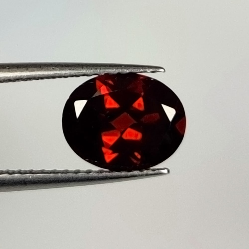 1.92 Ct Natural Almandite Garnet Oval Cut: Weight - 1.92 Ct / Dimensions - 9.00 x 7.10 x 4.10 mm / Shape - Oval Cut / Clarity - VVS / Origin - Nigeria / Treatment - None