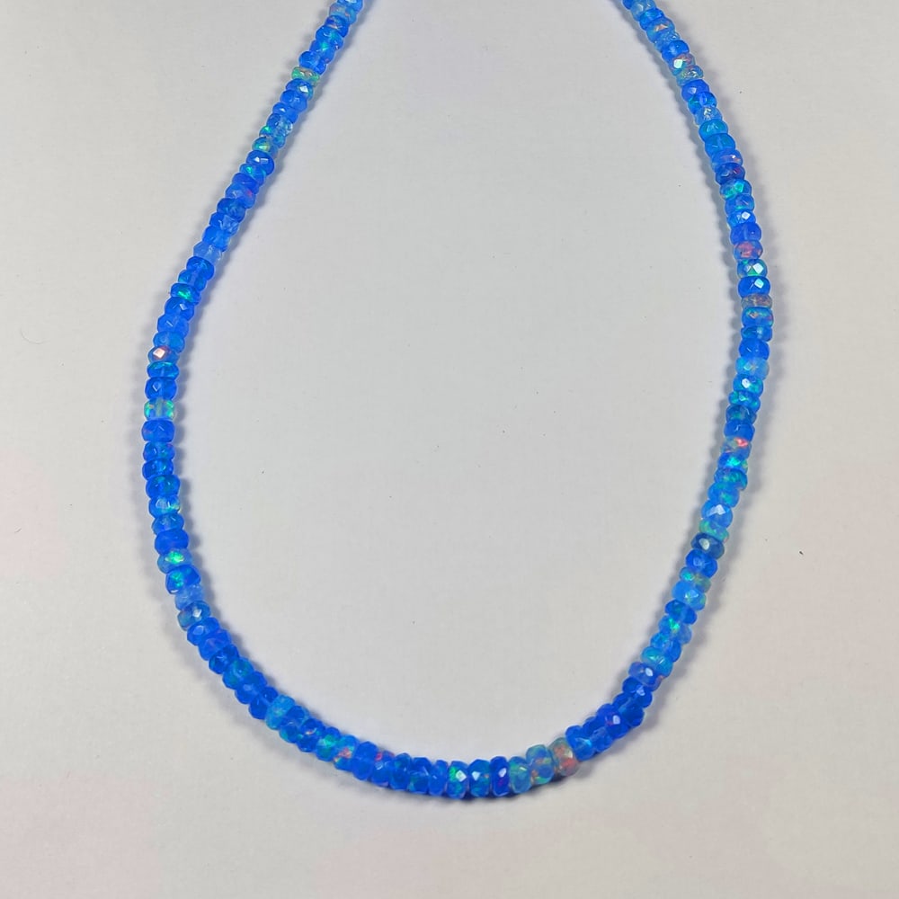 55.81 Ct Natural Blue Fire Opal Round Beads (1 of 2)