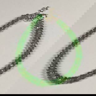 27.52 Ct Natural Green Tourmaline Round Beads Bracelet: Weight - 27.52 Ct / Dimensions - 4.50 - 5.20 mm / 57 Pc's / 7" inches / Shape & Cut - Round Cut Beads / Color - Green / Transparency - Transparent / Comments -None