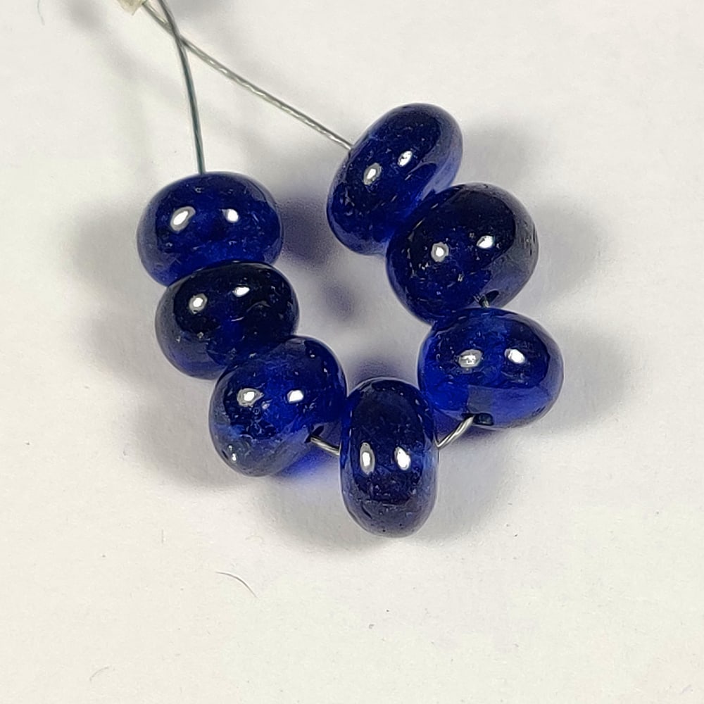 14.38 Ct Natural Blue Sapphire Round Beads: Weight - 14.38 Ct / Dimensions- 6.20 - 6.80 mm / 7 Pc's / Shape - Round Beads / Clarity - SI / Origin - Sri Lanka / Treatment - Heated