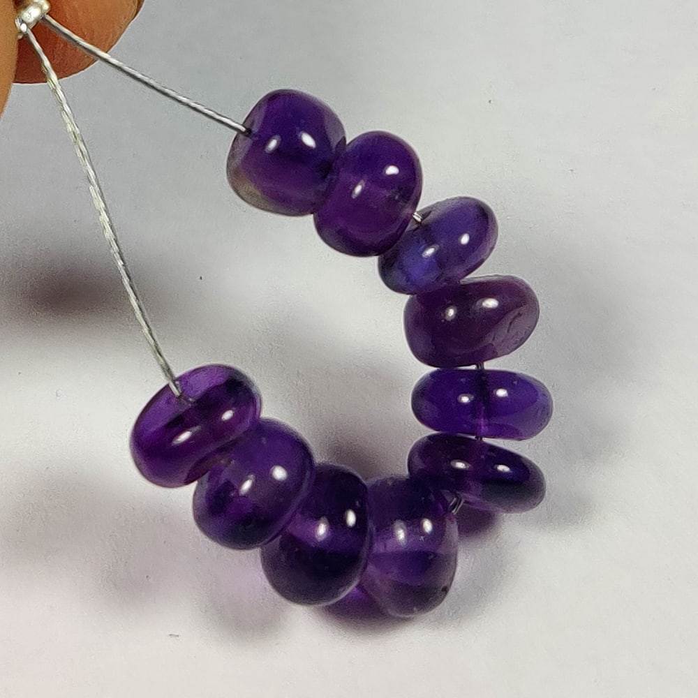 14.41 Ct Natural Purple Amethyst Round beads: Weight - 14.41 Ct / Dimensions - 6.40 - 7.10 mm / 10 Pc's / Shape - Round Beads / Color - Purple / Origin - Brazil / Treatment - Heated