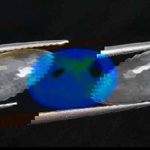 2.50 Ct Natural Blue Fire Opal Oval Cab: Weight - 2.50 Ct / Size - 12.30 x 7.90 x 4.90 mm / Shape - Oval Cab / Color - Blue / Clarity - Translucent / Origin - Ethiopia / Treatment - Heated