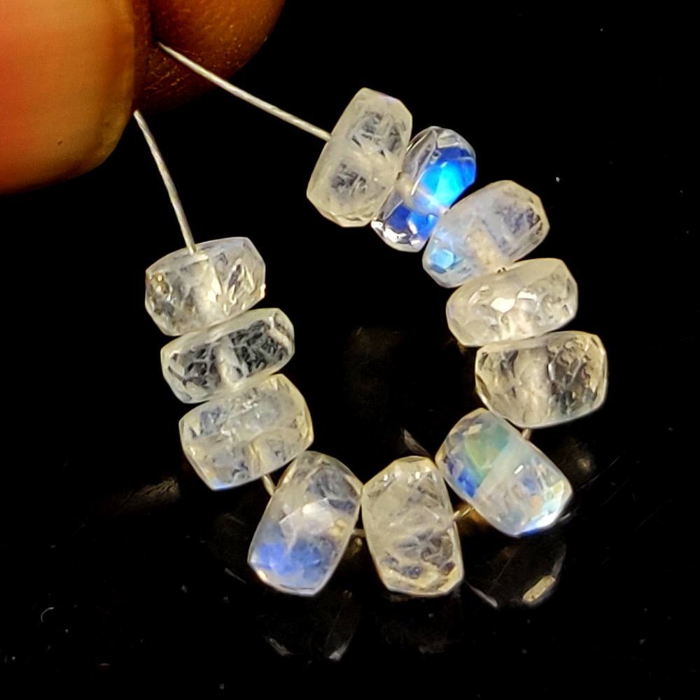 6.63 Ct Natural Blue Tint Moonstone Round Cut Beads: Weight - 6.63 Ct / Size -4.70 - 5.10 mm / 11 Pc's / Shape - Round Cut Beads / Clarity - Semi-Transparent / Origin - India / Treatment - None