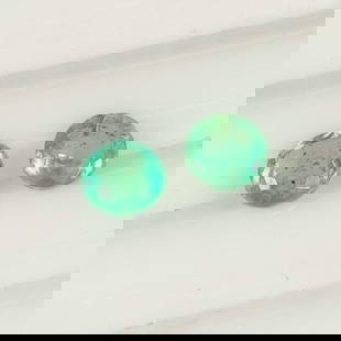 0.78 Ct Natural Zambian Green Emerald Round Cut Pair: Weight - 0.78 Ct / Dimensions - 4.80 x 4.80 x 3.10 mm / 2 Pc's / Shape - Round Cut / Color - Green / Clarity - SI / Origin - Zambia / Treatment - Natural Emeralds are commonly enhanced by oil
