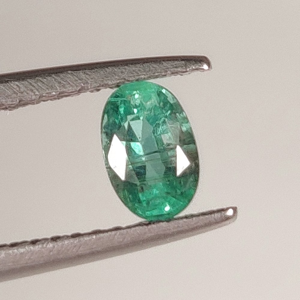0.48 Ct Natural Zambian Green Emerald Oval Cut (1 of 2)