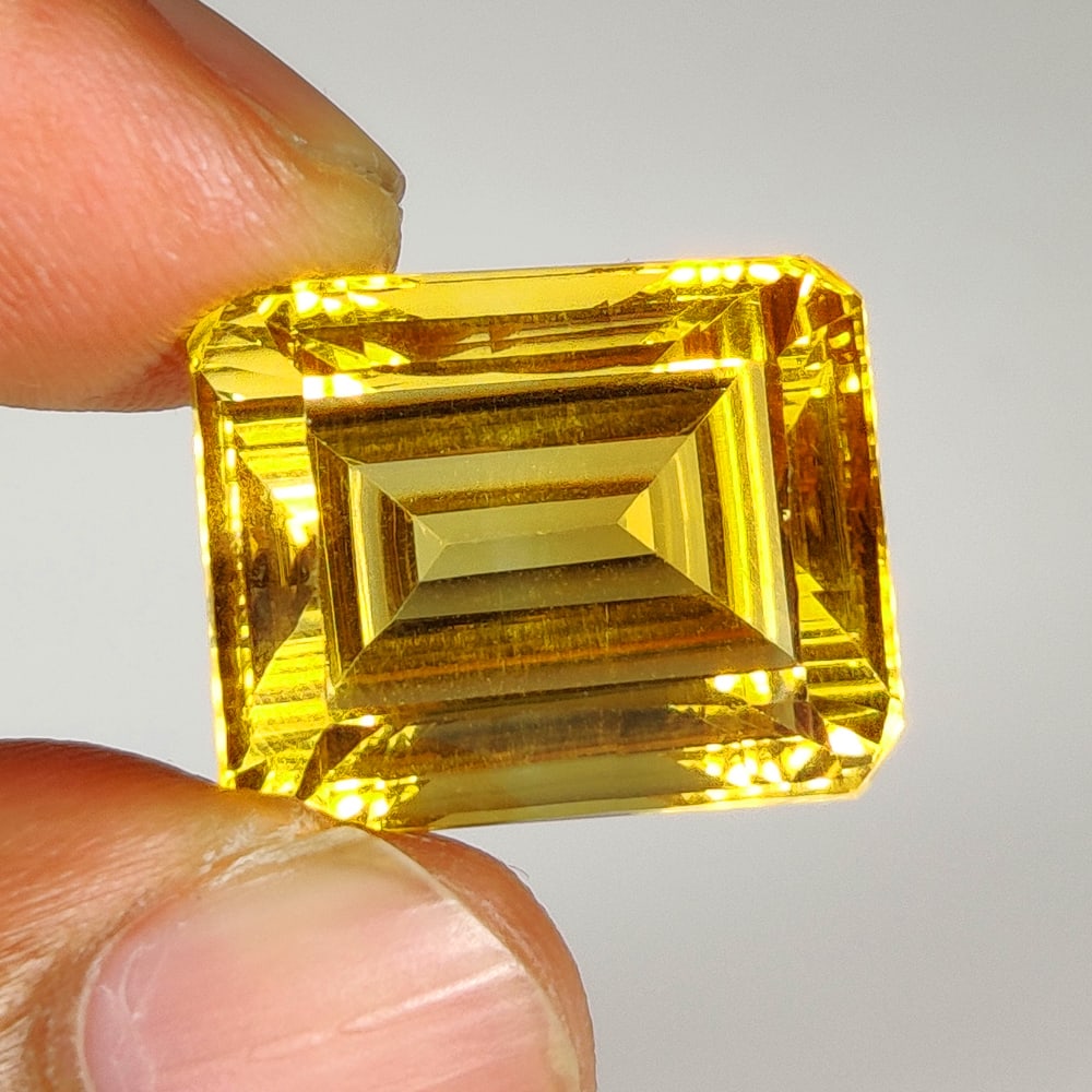 18.92 Ct Natural Yellow Citrine Octagon Cut: Weight - 18.92 Ct / Dimensions - 17.00 x 13.70 x 11.00 mm / Shape - Octagon Cut / Color - Yellow / Clarity - VVS / Origin - Brazil / Treatment - Heated