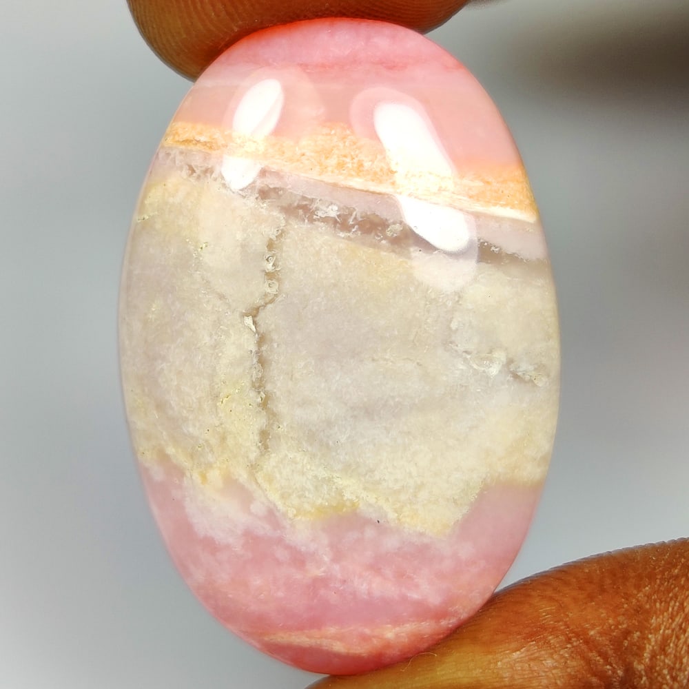 29.87 Ct Natural Pink Opal Oval Cab: Weight - 29.87 Ct / Dimensions - 32.00 x 22.00 x 6.60 mm / Shape - Oval Cabochon / Clarity - Opaque / Origin - Peru / Comments - Color Coated