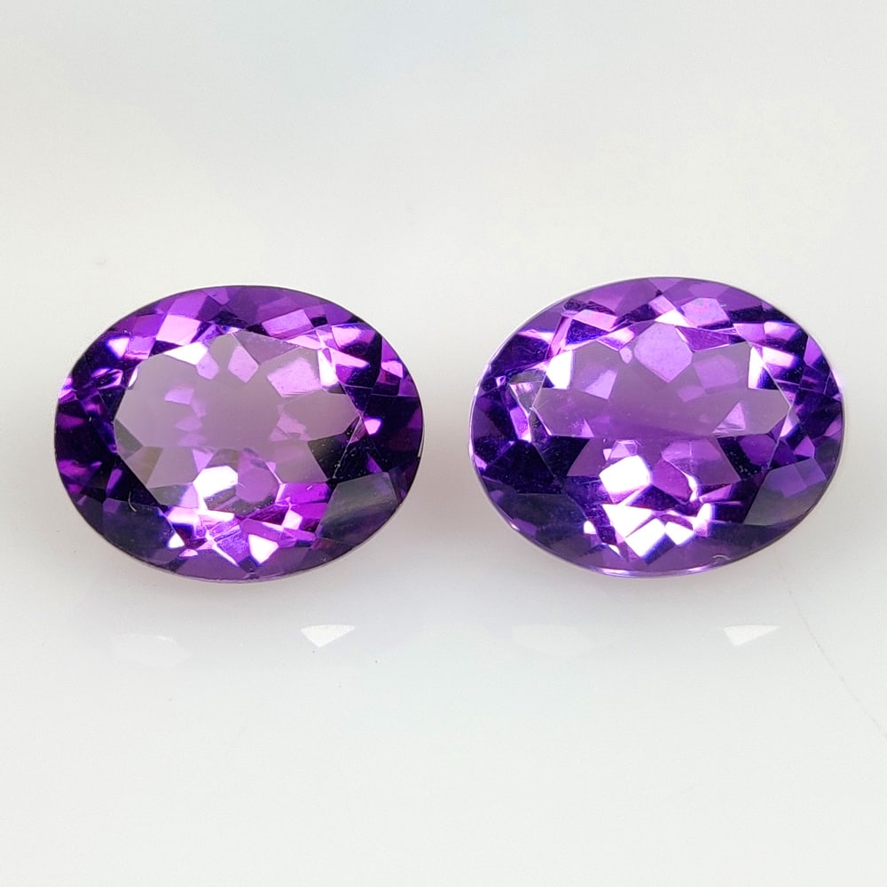 5.35 Ct Natural Purple Amethyst Oval Cut Pair: Weight - 5.35 Ct / Dimensions -10.30 x 8.30 x 5.60 mm / 2 Pc's / Shape - Oval Cut / Color - Purple / Clarity - VVS / Origin - Brazil / Treatment - Heated