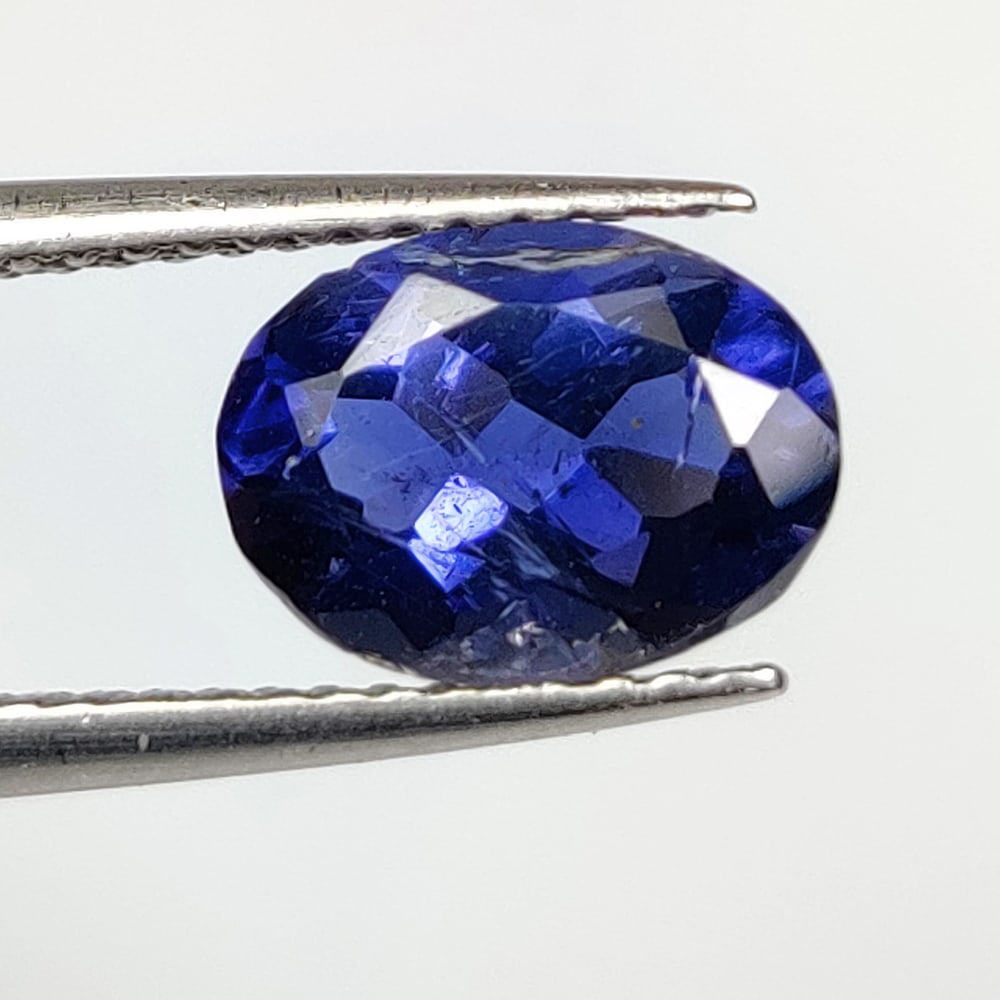 1.63 Ct Natural Violet Blue Iolite Oval Cut: Weight - 1.63 Ct / Dimensions - 9.00 x 6.70x 4.90 mm / Shape - Oval Cut / Color - Violet / Clarity - VVS / Origin - Brazil / Treatment - None