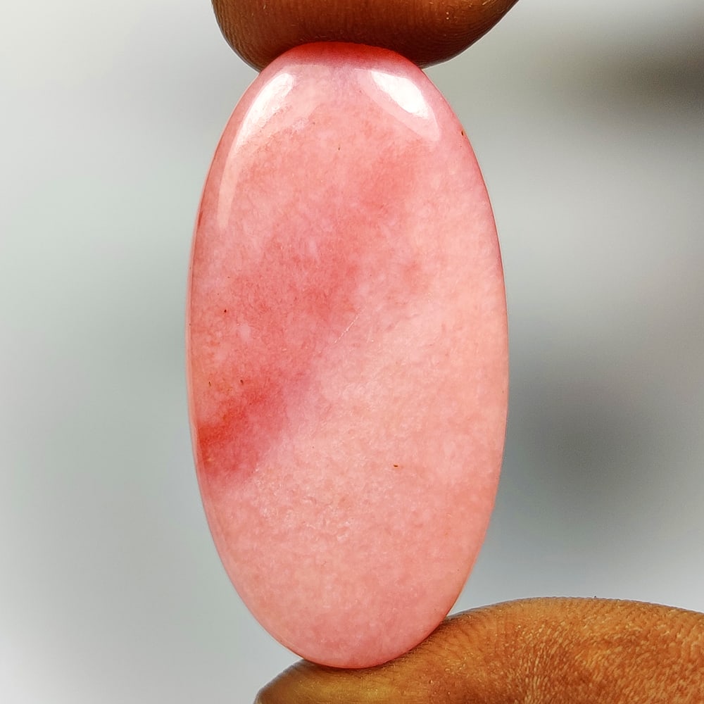 30.87 Ct Natural Pink Opal Oval Cab: Weight - 30.87 Ct / Size - 38.00 x 18.50 x 6.00 mm / Shape - Oval Cab / Clarity - Opaque / Origin - Peru / Treatment - None