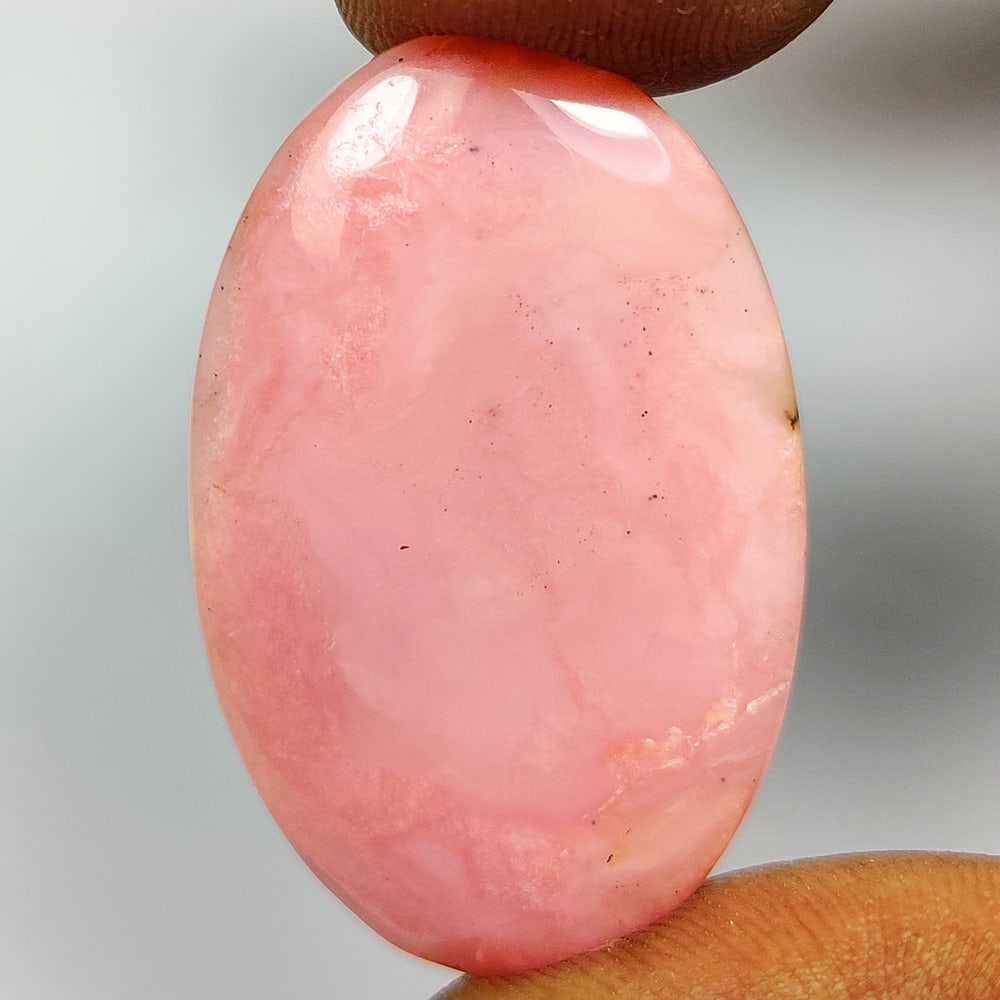 20.72 Ct Natural Pink Opal Oval Cab: Weight - 20.72 Ct / Size - 33.00 x 21.10 x 4.80 mm / Shape - Oval Cab / Clarity - Opaque / Origin - Peru / Treatment - None
