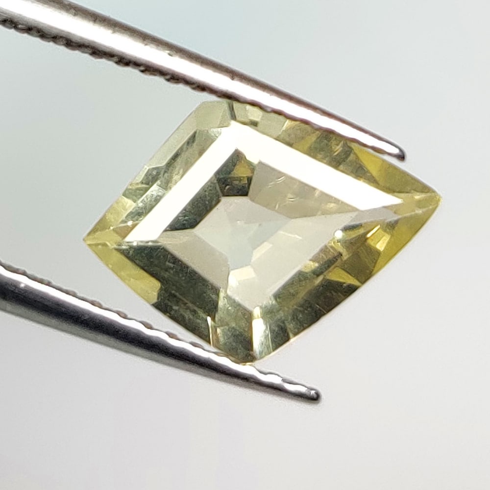 1.71 Ct Natural Yellow Citrine Fancy Cut: Weight - 1.71 Ct / Dimensions - 11.40 x 8.30 x 4.50 mm / Shape - Fancy Cut / Clarity - VVS / Origin - Brazil / Treatment - Heated