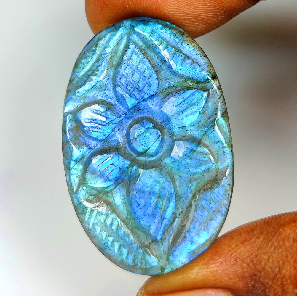 41.04 Ct Natural Blue Shaded Labradorite Oval Carving Cab: Weight - 41.04 Ct / Dimensions - 38.00 x 25.00 x 5.50 mm / Shape - Excellent Oval Carving Cab / Clarity - Opaque / Origin - Africa / Treatment - None