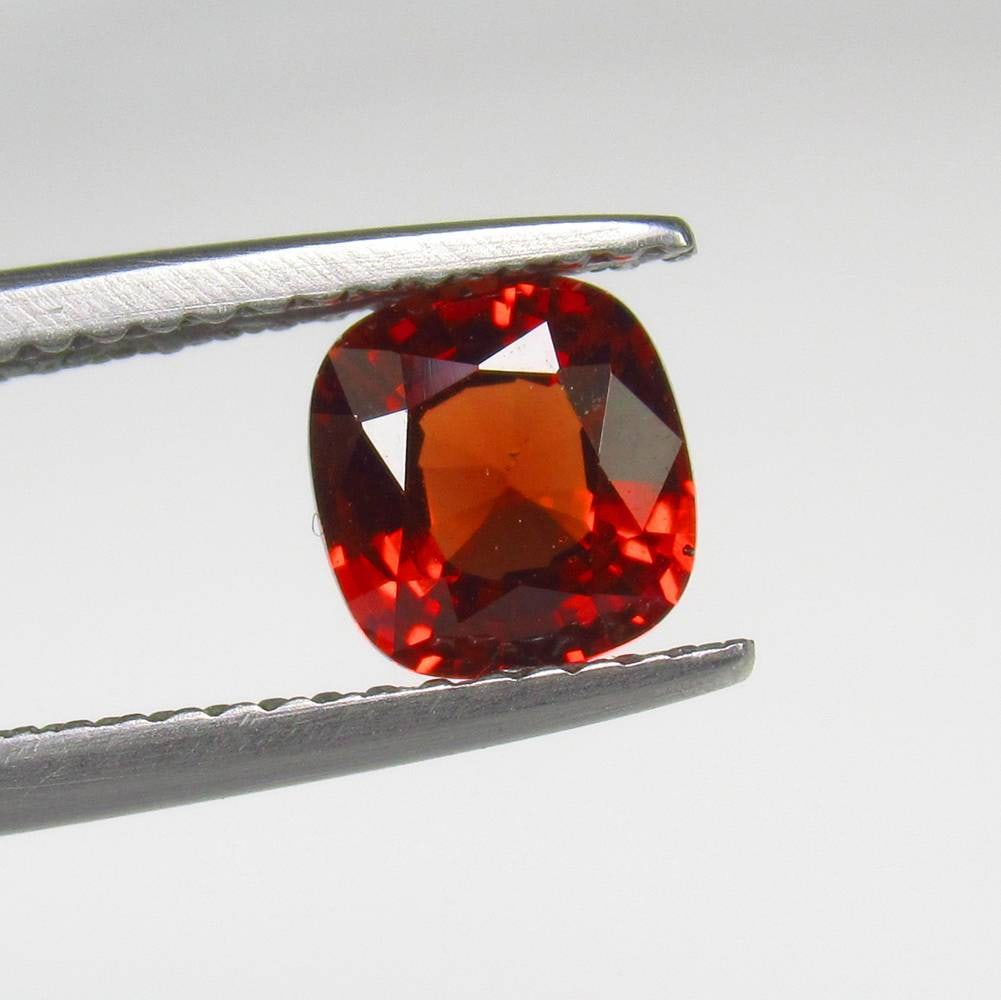 1.36 Ct Natural Malaya Garnet Cushion Cut (1 of 3)