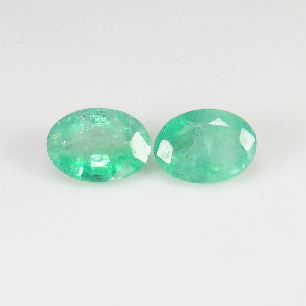 1.62 Ct Natural Zambian Emerald Oval Pair (1 of 2)