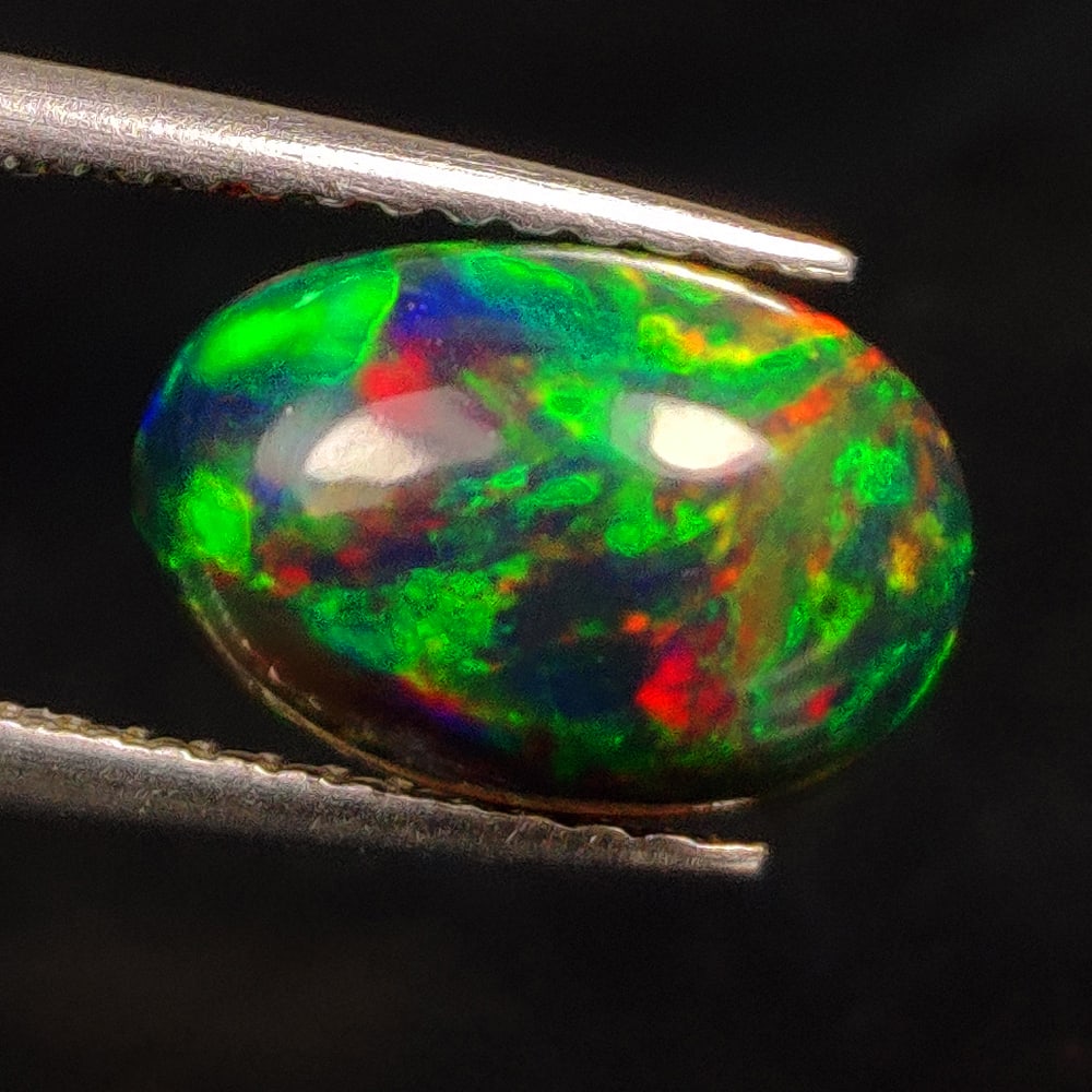 1.78 Ct Natural Black Fire Opal Oval Cab (1 of 3)