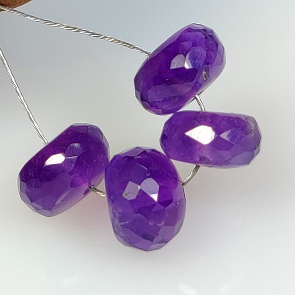 8.00 Ct Natural Purple Amethyst Round Cut beads: Weight - 8.00 Ct / Dimensions -7.50 - 7.70 mm / 4 Pc's / Shape - Round cut Beads / Color - Purple / Clarity - VVS / Origin -Brazil / Treatment - Heated