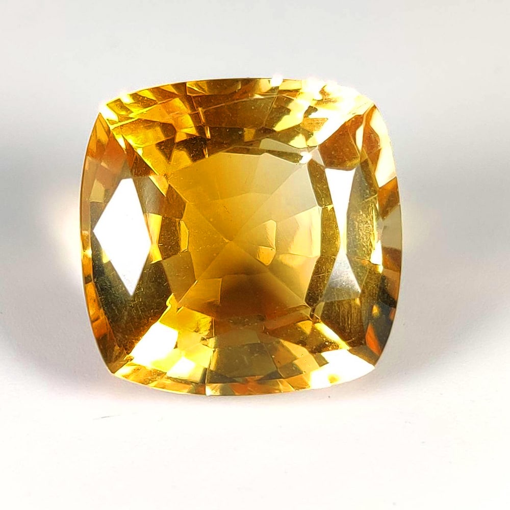 10.73 Ct Natural Yellow Citrine Top Luster Cushion Cut: Weight - 10.73 Ct / Dimensions -13.50 x 13.30 x 9.00 mm / Shape - Cushion Cut / Color - Yellow / Clarity - VVS / Origin - Brazil / Treatment - Heated