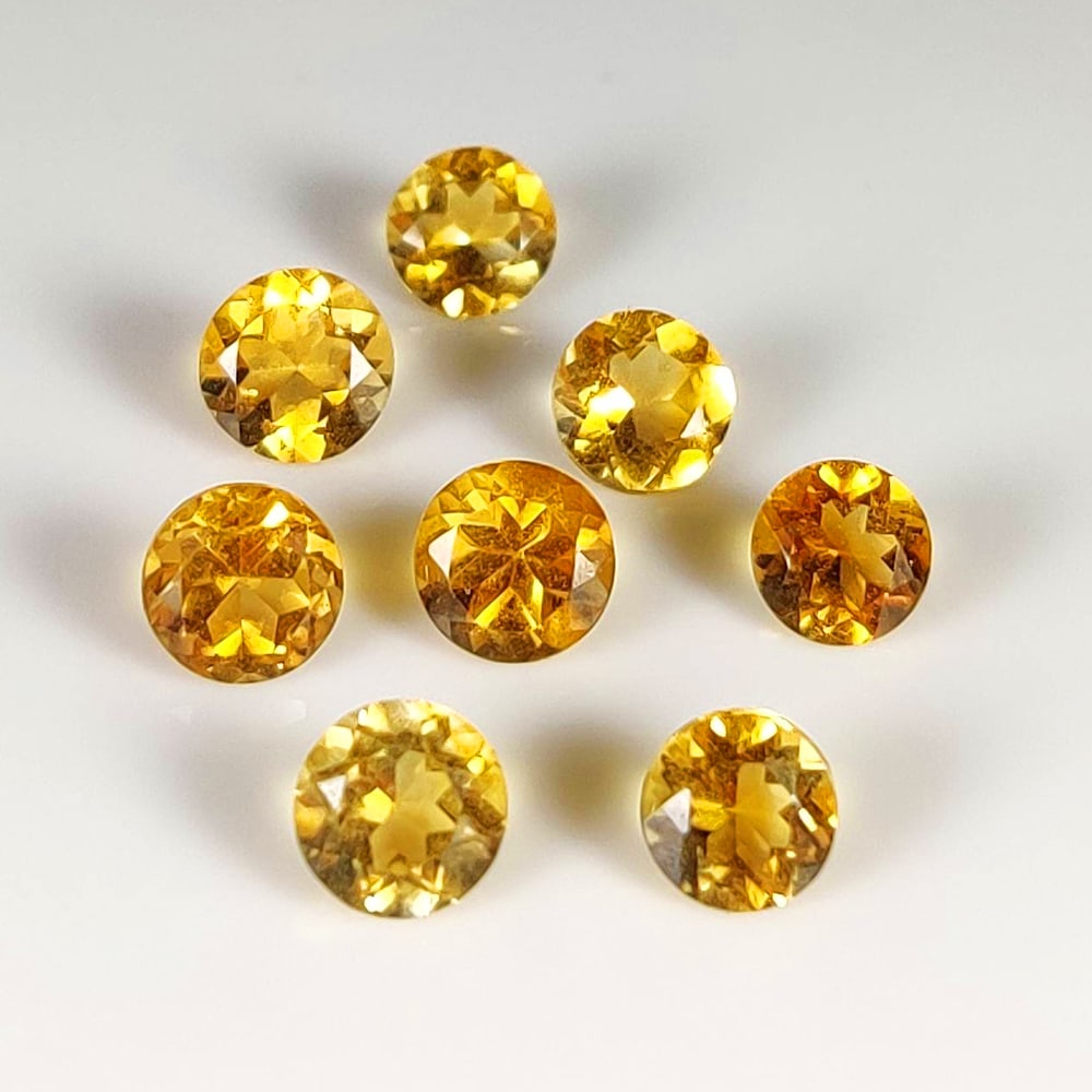 3.90 Ct Natural Citrine Round Cut Set: Weight - 3.90 Ct / Dimensions - 4.80 - 5.30 mm / 8 Pc's / Shape - Round Cut / Color - Orangish Yellow / Clarity - VVS / Origin - Brazil / Treatment - Heated
