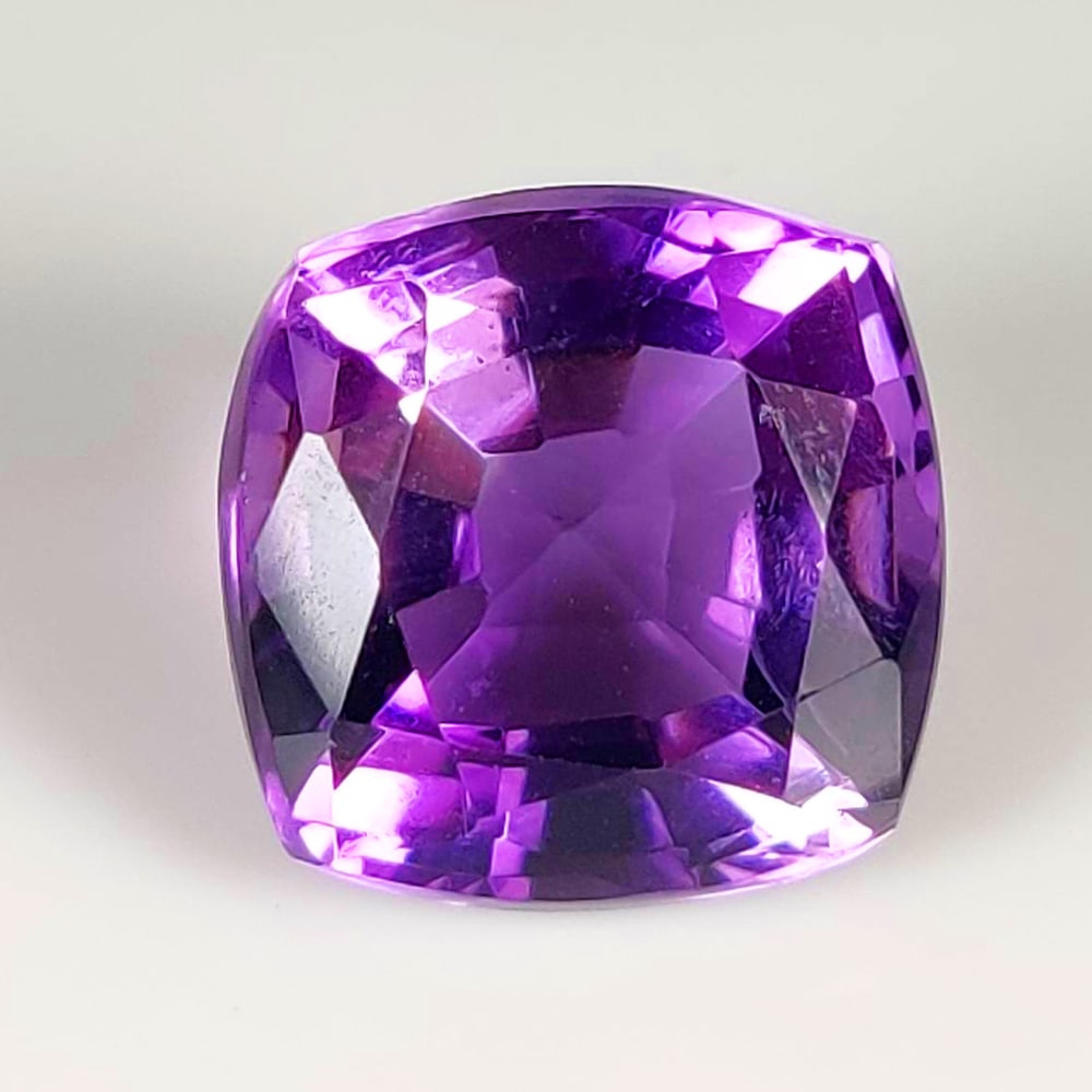 14.21 Ct Natural Purple Amethyst Cushion Cut: Weight - 14.21 Ct / Dimensions - 14.60 x 14.60 x 10.30 mm / Shape - Cushion Cut / Color - Purple / Clarity - VVS / Origin - Brazil / Treatment - Heated