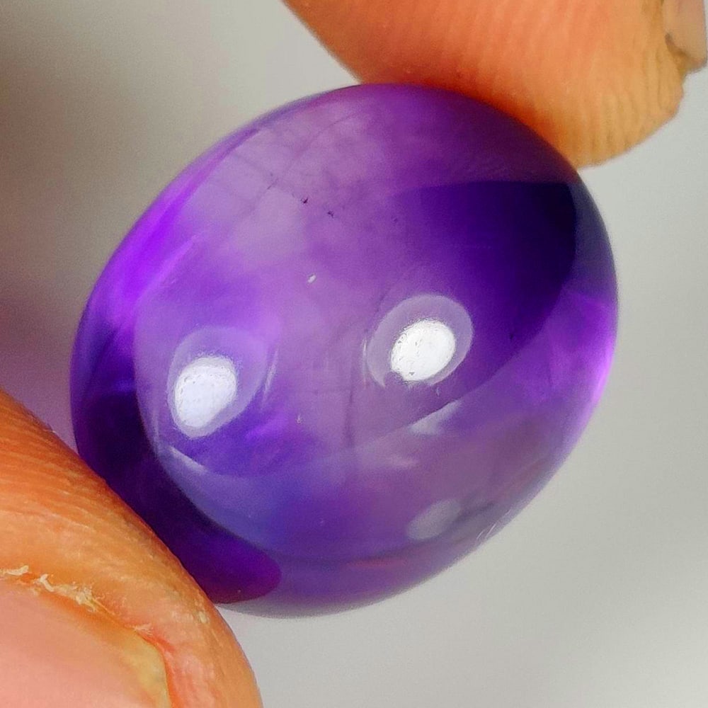 17.61 Ct Natural Purple Amethyst Oval Cab: Weight - 17.61 Ct / Dimensions - 16.50 x 13.50 x 11.00 mm / Shape - Oval Cab / Color - Purple / Clarity - Transparent / Origin -Brazil / Treatment - Heated
