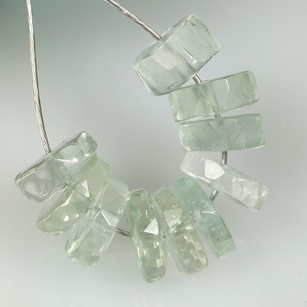 11.41 Ct Natural Green Amethyst Round Cut Beads: Weight - 11.41 Ct / Size - 6.80 - 7.40 mm / 10 Pc's / Shape - Round Cut Beads / Color - Green / Clarity - VVS / Origin - Brazil / Treatment - Heated