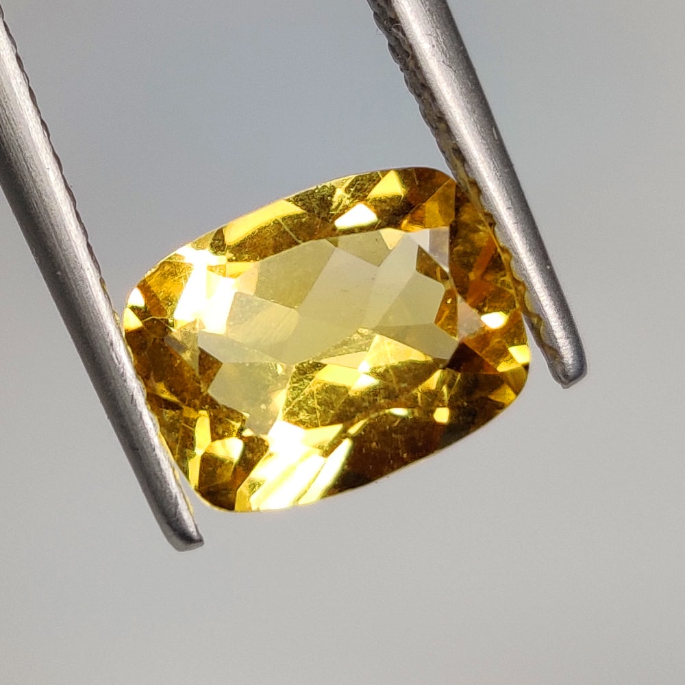 1.90 Ct Natural Yellow Citrine Cushion Cut: Weight - 1.90 Ct / Dimensions - 9.20 x 7.00 x 4.70 mm / Shape & Cut - Cushion Cut / Color - Yellow / Transparency - VVS / Origin - Brazil / Comments - Heated