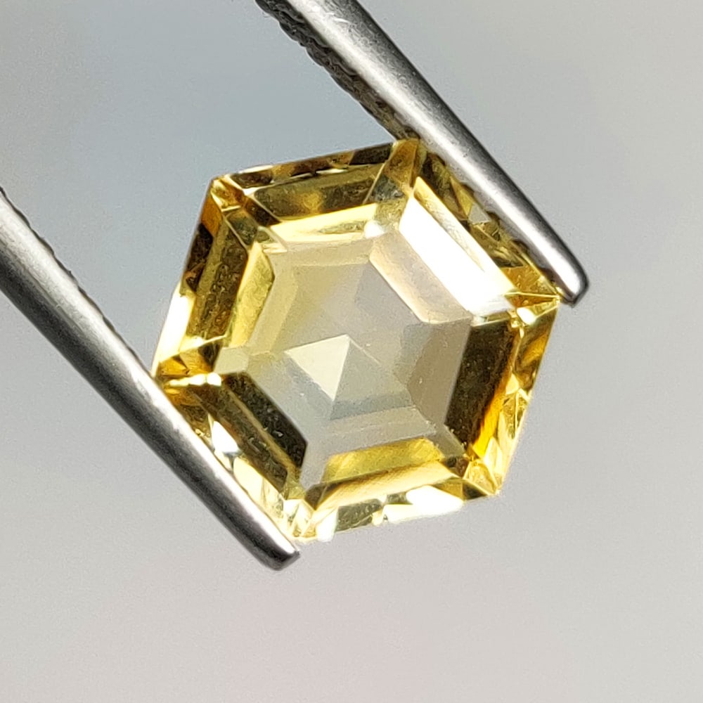2.20 Ct Natural Yellow Citrine Hexagon Cut: Weight - 2.20 Ct / Dimensions - 9.20 x 8.00 x 5.10 mm / Shape & Cut - Hexagon Cut / Color - Yellow / Transparency - VVS / Origin - Brazil / Comments - Heated