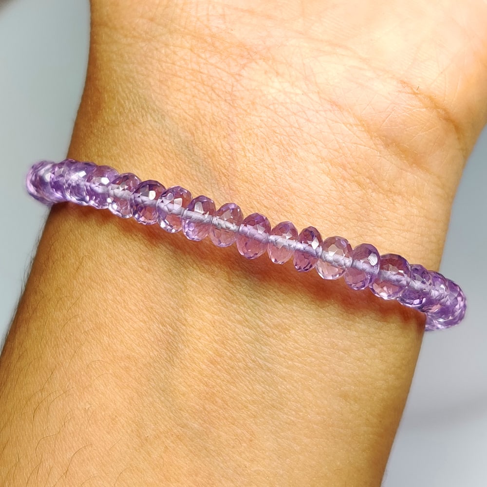 28.08 Ct Natural Purple Amethyst Round Cut Beads Bracelet: Weight - 28.08 Ct / Size - 4.40 - 8.10 mm / 47 Pc's / 7.75" inches / Shape - Round Cut Beads / Color - Purple / Clarity - VVS / Origin -Brazil / Treatment - Heated