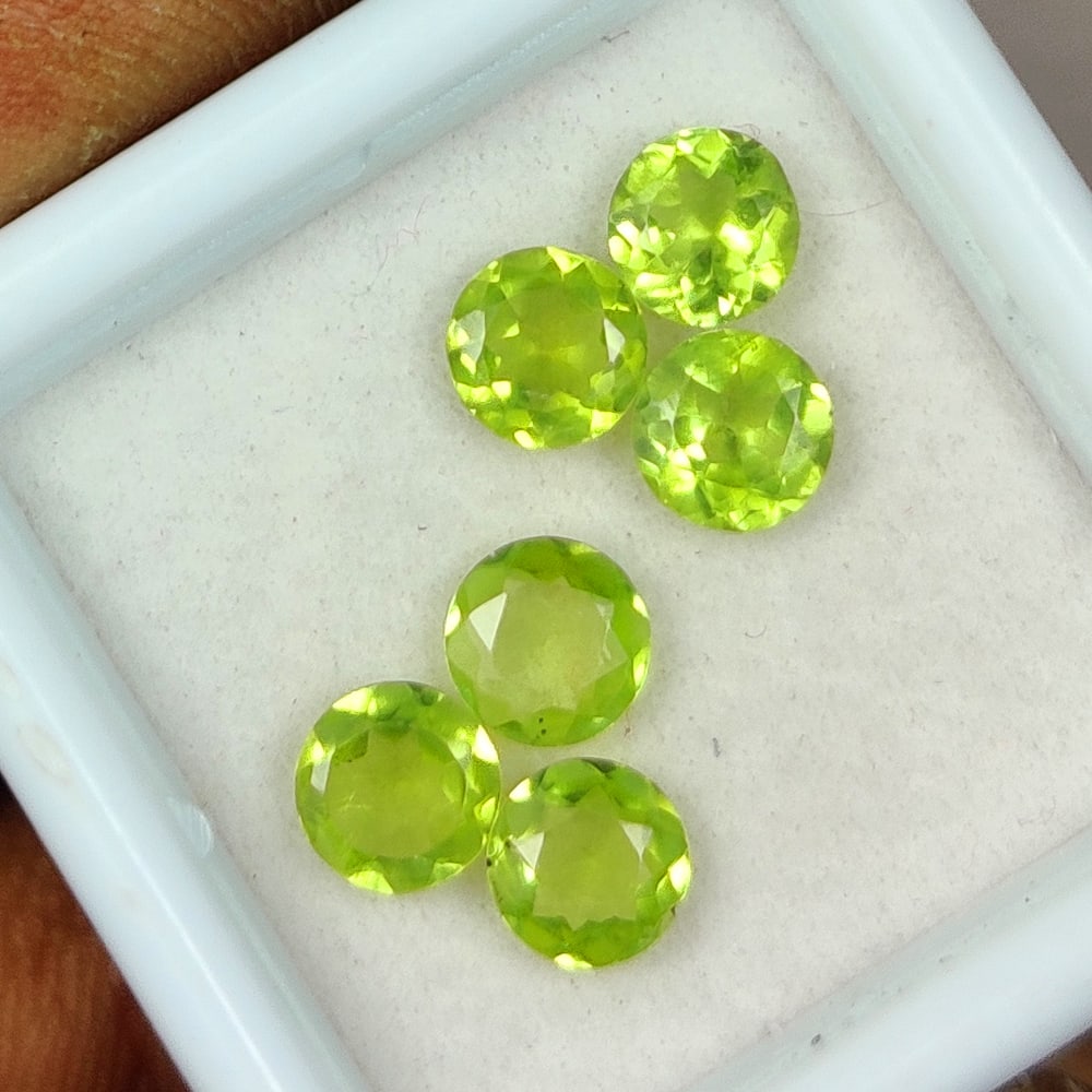 2.43 Ct Natural Green Peridot Round Cut Set: Weight - 2.43 Ct / Size -4.80 - 5.20 mm / 6 Pc's / Shape - Round Cut / Color - Green / Clarity - VVS / Origin - Pakistan / Treatment - None