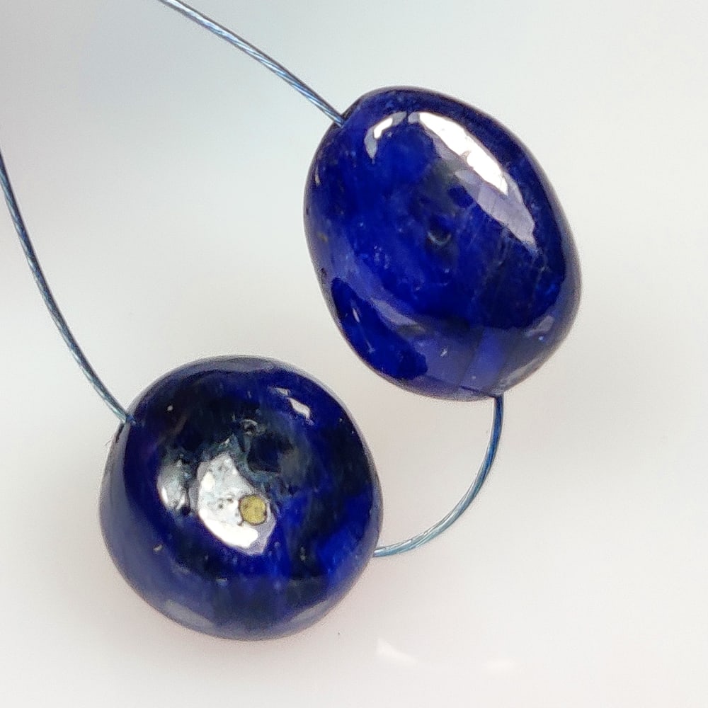 11.98 Ct Natural Blue Sapphire Dumble Beads: Weight - 11.98 Ct / Dimensions - 8.50 - 9.20 mm / 2 Pc's / Shape - Dumble Beads / Clarity - SI / Origin - Sri Lanka / Treatment - Standard Heated