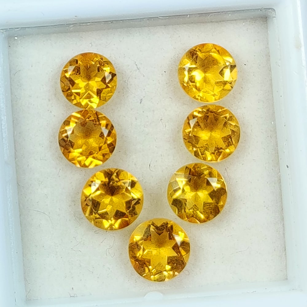 3.02 Ct Natural Yellow Citrine Round Cut Set: Weight - 3.02 Ct / Dimensions -5.10 - 5.40 mm / 7 Pc's / Shape & Cut - Round Cut / Color - Yellow / Transparency - VVS / Origin - Brazil / Comments - Heated