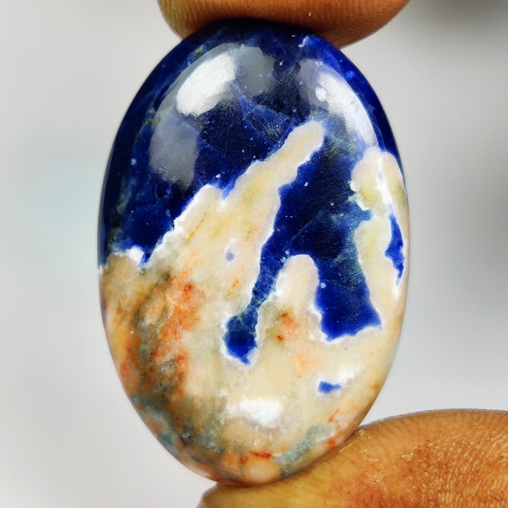 25.12 Ct Natural Blue Sodalite Oval Cab: Weight - 25.12 Ct / Size - 32.00 x 20.40 x 5.40 mm / Shape - Oval Cab / Clarity - Opaque / Origin - Russia / Treatment - None