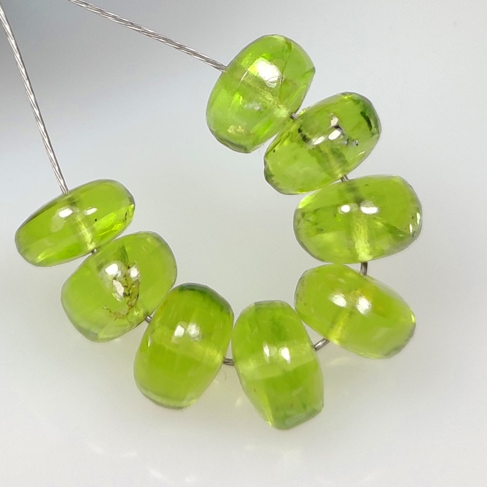 9.92 Ct Natural Green Peridot Round Beads: Weight - 9.92 Ct / Dimensions - 5.80 - 6.10 mm / 8 Pc's / Shape - Round Beads / Color - Green / Clarity - VVS / Origin - Pakistan / Treatment - None