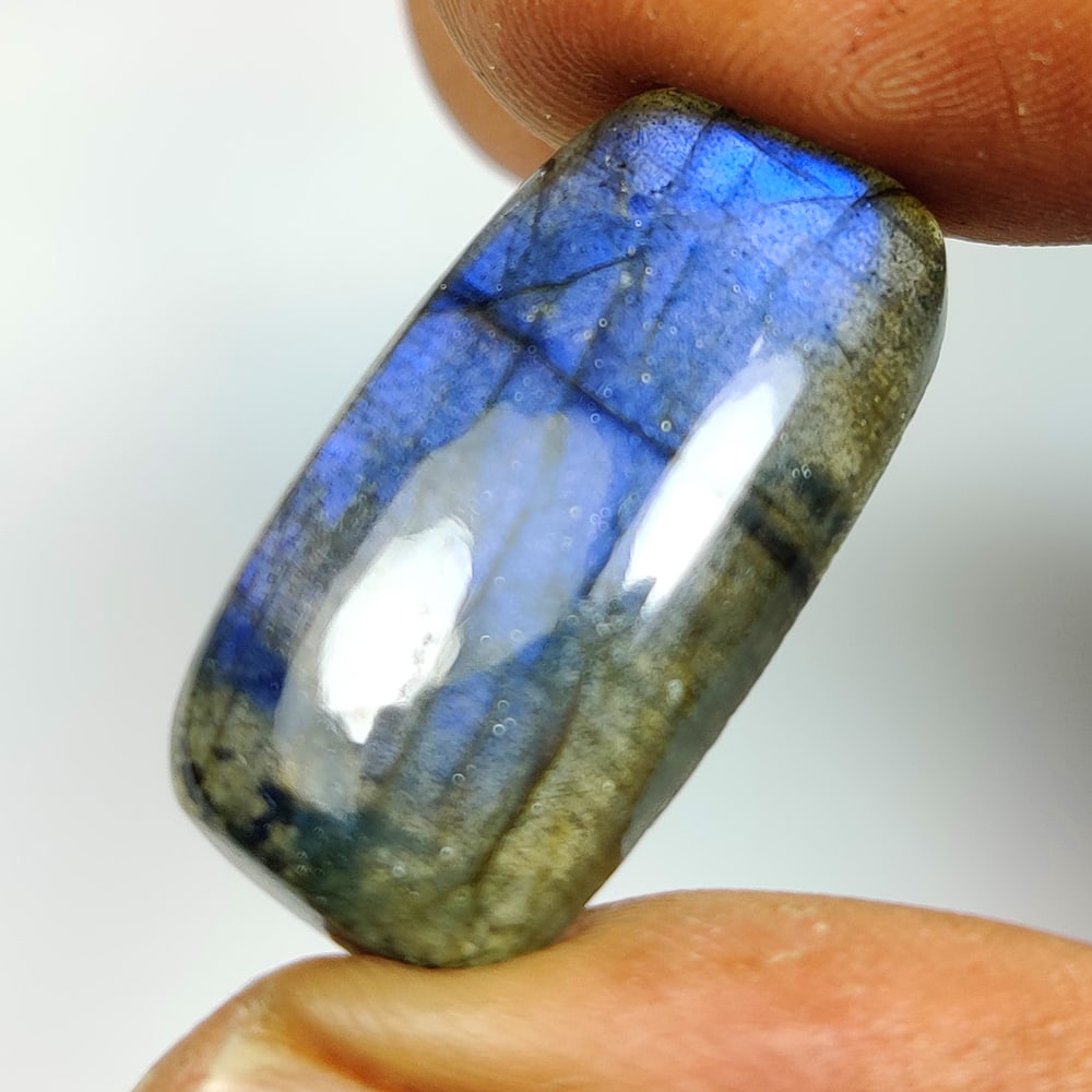 16.78 Ct Natural Labradorite Cushion Cab: Weight - 16.78 Ct / Size -25.00 x 12.20 x 5.90 mm / Shape - Excellent Cushion Cab / Clarity - Opaque / Origin - Africa / Treatment - None