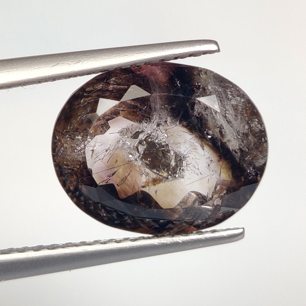 5.00 Ct Natural Rutile Quartz Oval Cut: Weight - 5.00 Ct / Dimensions -12.70 x 10.20 x 7.10 mm / Shape - Oval Cut / Clarity - Transparent / Origin - Norway / Treatment - None