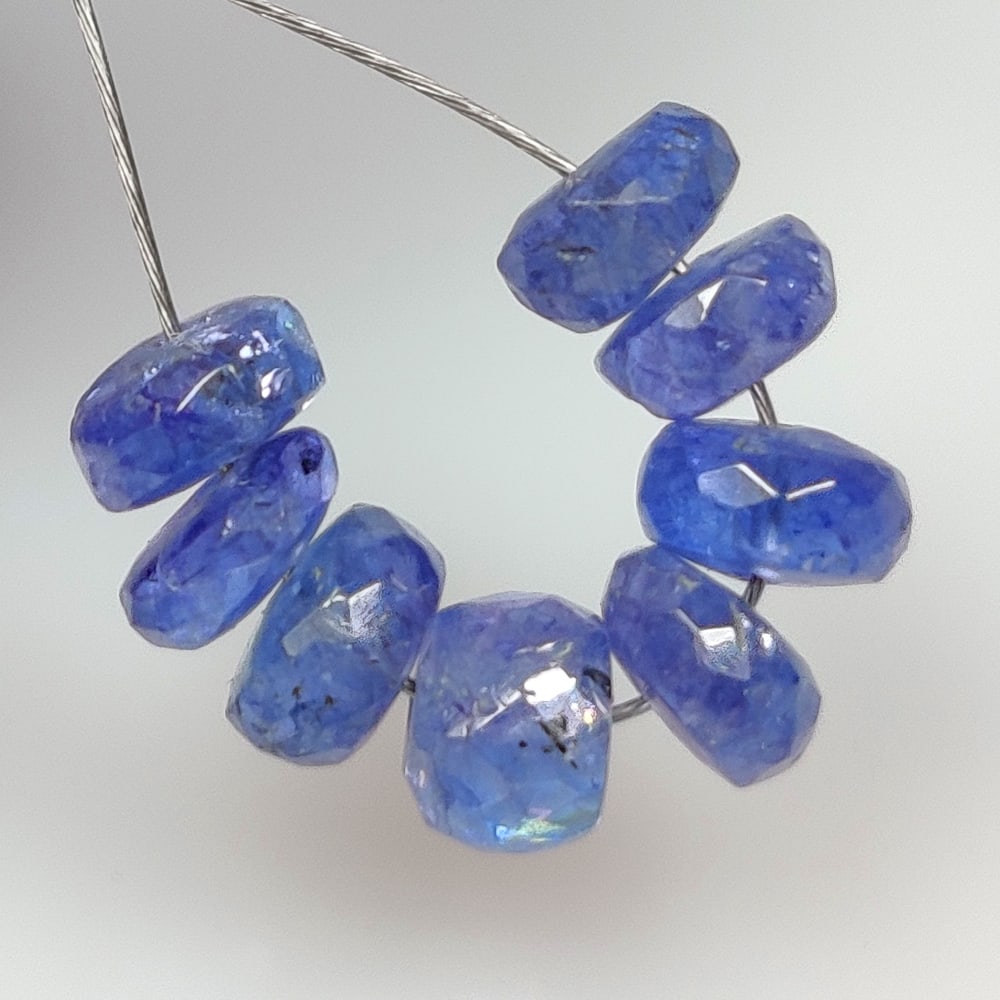 5.61 Ct Natural Tanzanite Round Cut Beads: Weight - 5.61 Ct / Dimensions- 5.00 -5.20 mm / 8 Pc's / Shape & Cut - Round Cut Beads / Origin - Tanzania / Comments - Standard Heated