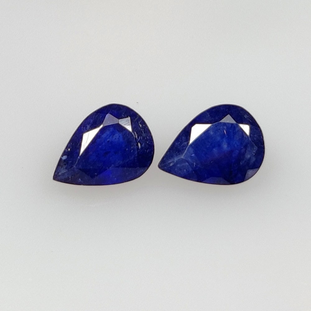 1.72 Ct Natural Blue Sapphire Pear Cut Pair: Weight - 1.72 Ct / Dimensions- 7.10 x 5.20 x 2.90 mm / 2 Pc's / Shape - pear Cut / Clarity - Opaque / Origin - Sri Lanka / Treatment - Diffused