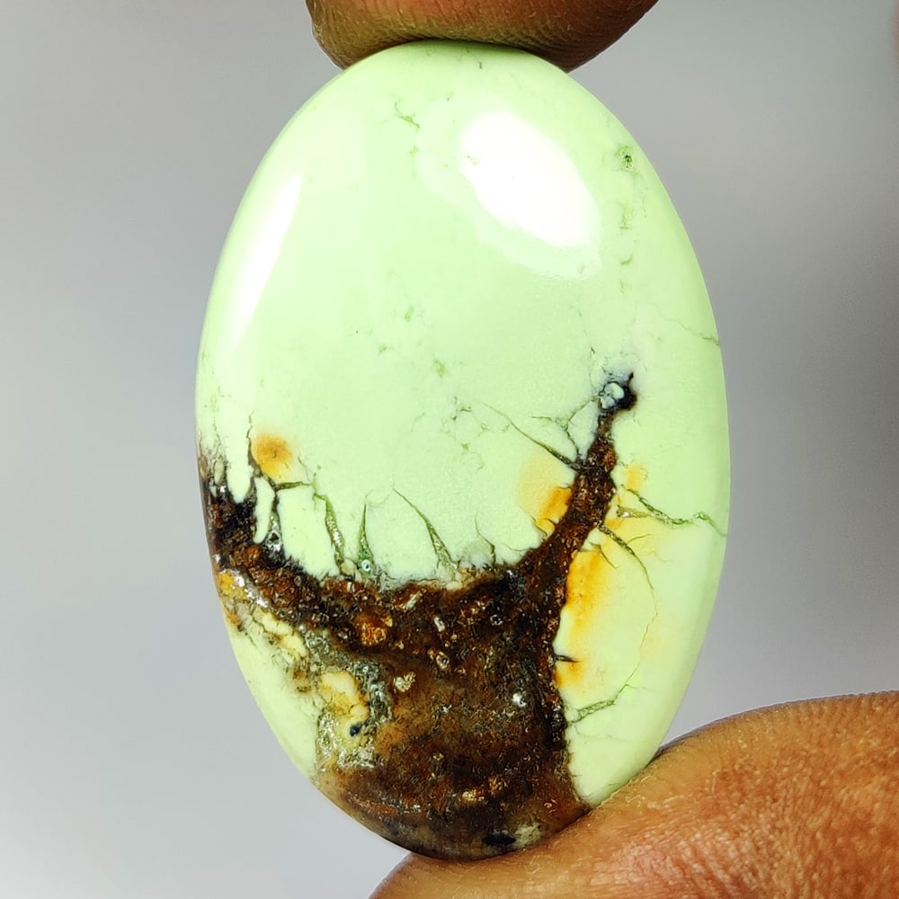 28.27 Ct Natural lemon Chrysoprase Oval Cab: Weight - 28.27 Ct / Size - 33.00 x 21.10 x 4.90 mm / Shape - Oval Cab / Clarity - Opaque / Origin - Brazil / Treatment - None