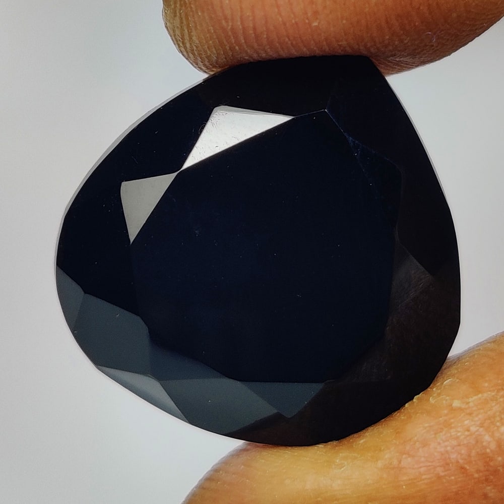 12.64 Ct Natural Black Onyx Pear Cut: Weight - 12.64 Ct / Size - 17.60 x 17.20 x 7.70 mm / Shape - Pear Cut / Color - Black / Clarity - OPaque / Origin - Africa / Treatment - None