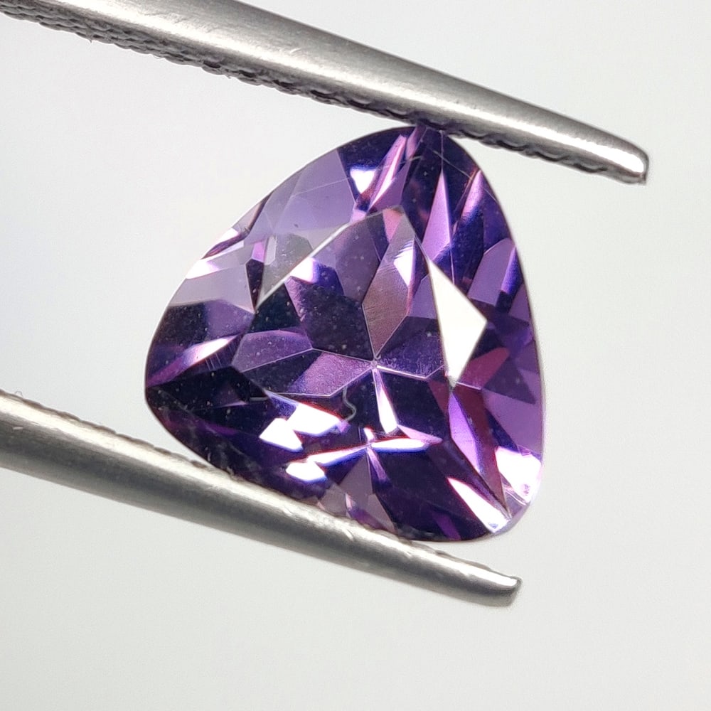 2.55 Ct Natural Purple Amethyst Trillion Cut: Weight - 2.55 Ct / Dimensions - 8.90 x 9.00 x 7.10 mm / Shape - Trillion Cut / Color - Purple / Clarity - VVS / Origin -Brazil / Treatment - Heated