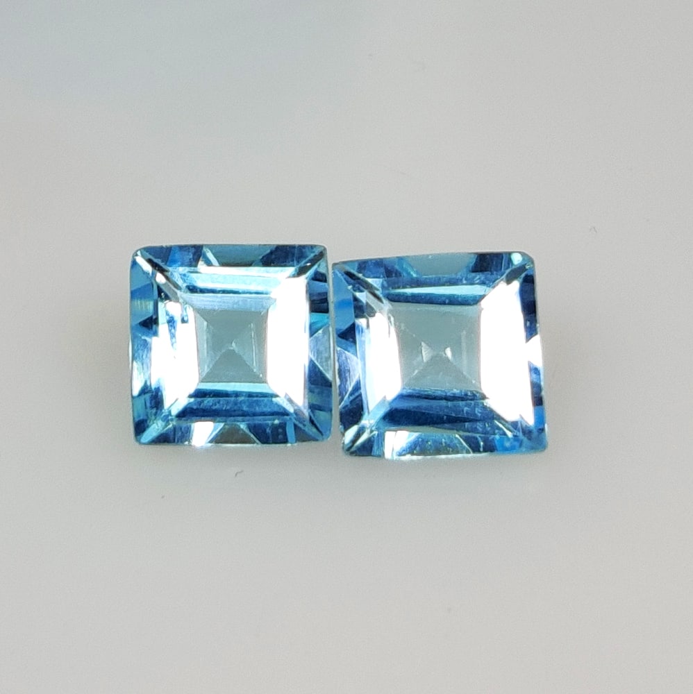 3.54 Ct Natural Blue Topaz Square Cut Pair: Weight - 3.54 Ct / Size - 6.90 x 6.90 x 4.20 mm / 2 PC's / Shape - Square Cut / Color - Blue / Clarity - VVS / Origin - Brazil / Treatment - Irradiated