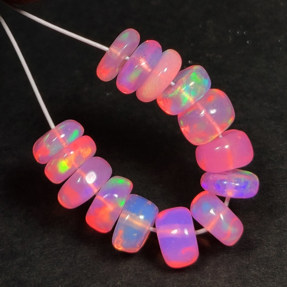 3.78 Ct Natural Pink FIre Opal Round Beads: Weight - 3.78 Ct / Dimensions - 4.50 - 4.90 mm / 14 Pc's / Shape & Cut - Drilled Round Beads / Color - Pink / Transparency - Translucent / Origin - Ethiopia / Comments - Color Heated