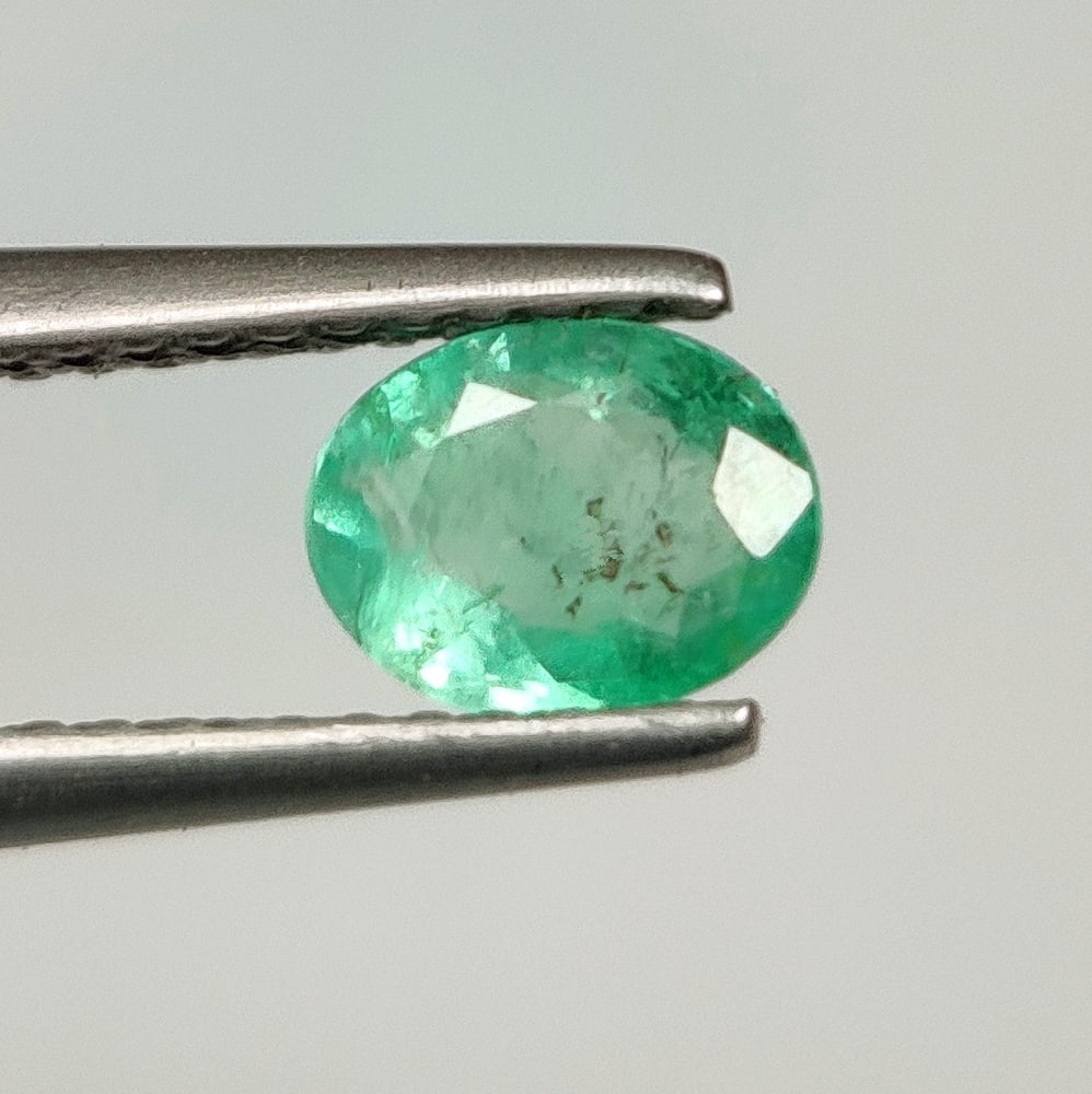 0.57 Ct Natural Zambian Green Emerald OVal Cut: Weight - 0.57 Ct / Size - 6.30 x 4.90 x 3.00 mm / Shape - Oval Cut / Color - Green / Clarity - SI / Origin - Zambia / Treatment - Natural Emeralds are commonly enhanced by oil