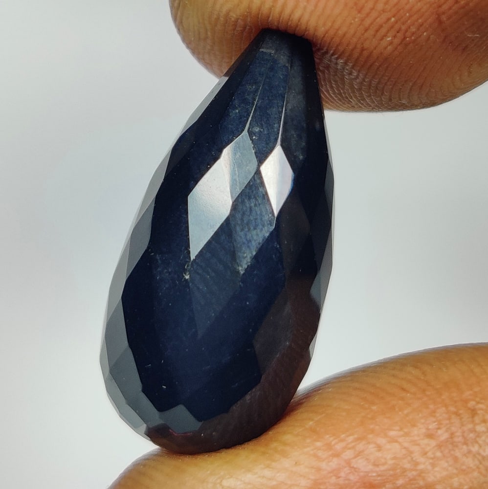 12.93 Ct Natural Black Onyx Fancy Pear Drop: Weight - 12.93 Ct / Size - 20.70 x 9.80 x 9.80 mm / Shape - Fancy Pear Drop / Clarity - Opaque / Origin - Brazil / Treatment - None