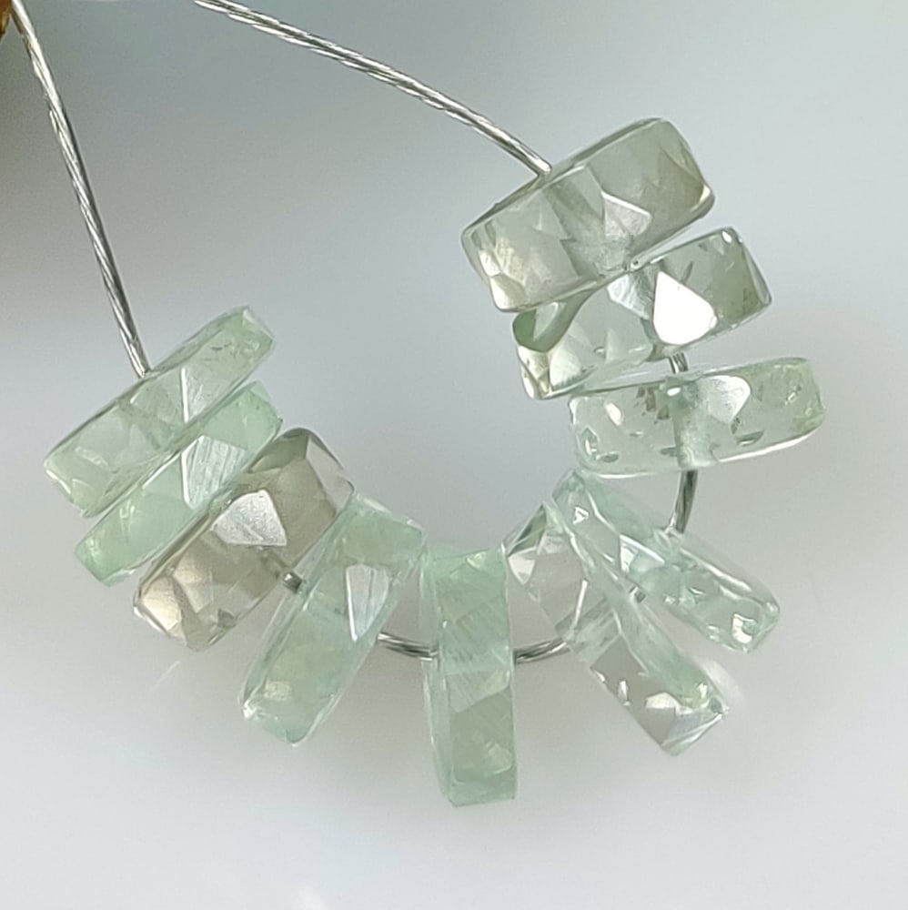 11.37 Ct Natural Green Amethyst Round Cut Beads: Weight - 11.37 Ct / Size - 7.00 - 7.70 mm / 10 PC's / Shape - Round Cut Beads / Color - Green / Clarity - VVS / Origin - Brazil / Treatment - Heated