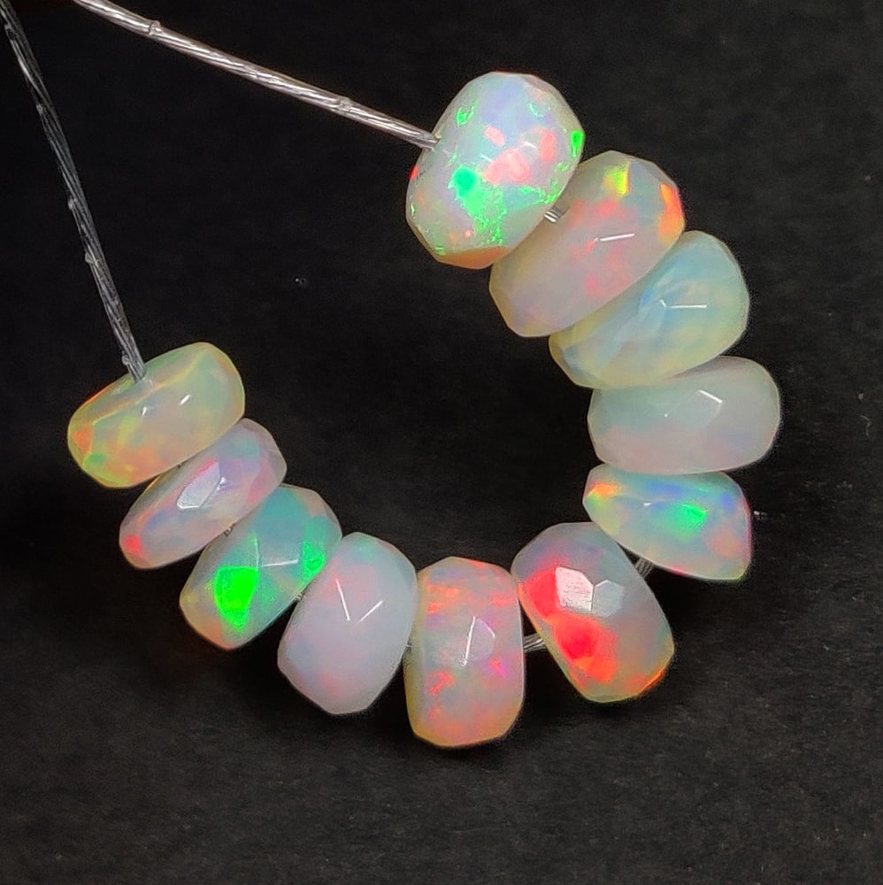 4.89 Ct Natural Multicolor Welo Opal Round Beads: Weight - 4.89 Ct / Size -5.20 - 5.70 mm / 11 PC's / Shape - Round Beads / Color - Multicolor / Clarity - Translucent / Origin - Ethiopia / Treatment - None