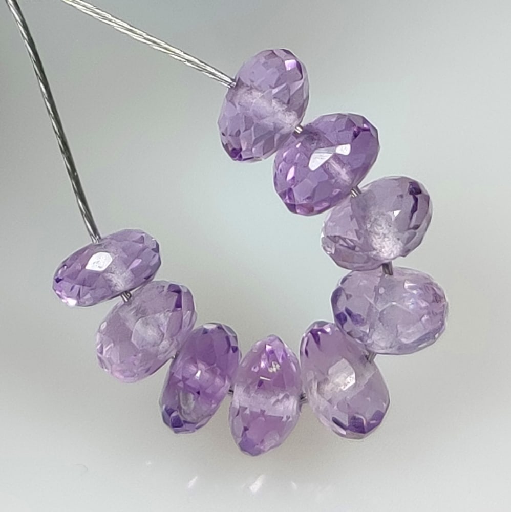 5.36 Ct Natural Purple Amethyst Round Cut Beads: Weight - 5.36 Ct / Size - 4.90 - 5.20 mm / 9 PC's / Shape - Round Cut Beads / Color - Purple / Clarity - VVS / Origin -Brazil / Treatment - Heated