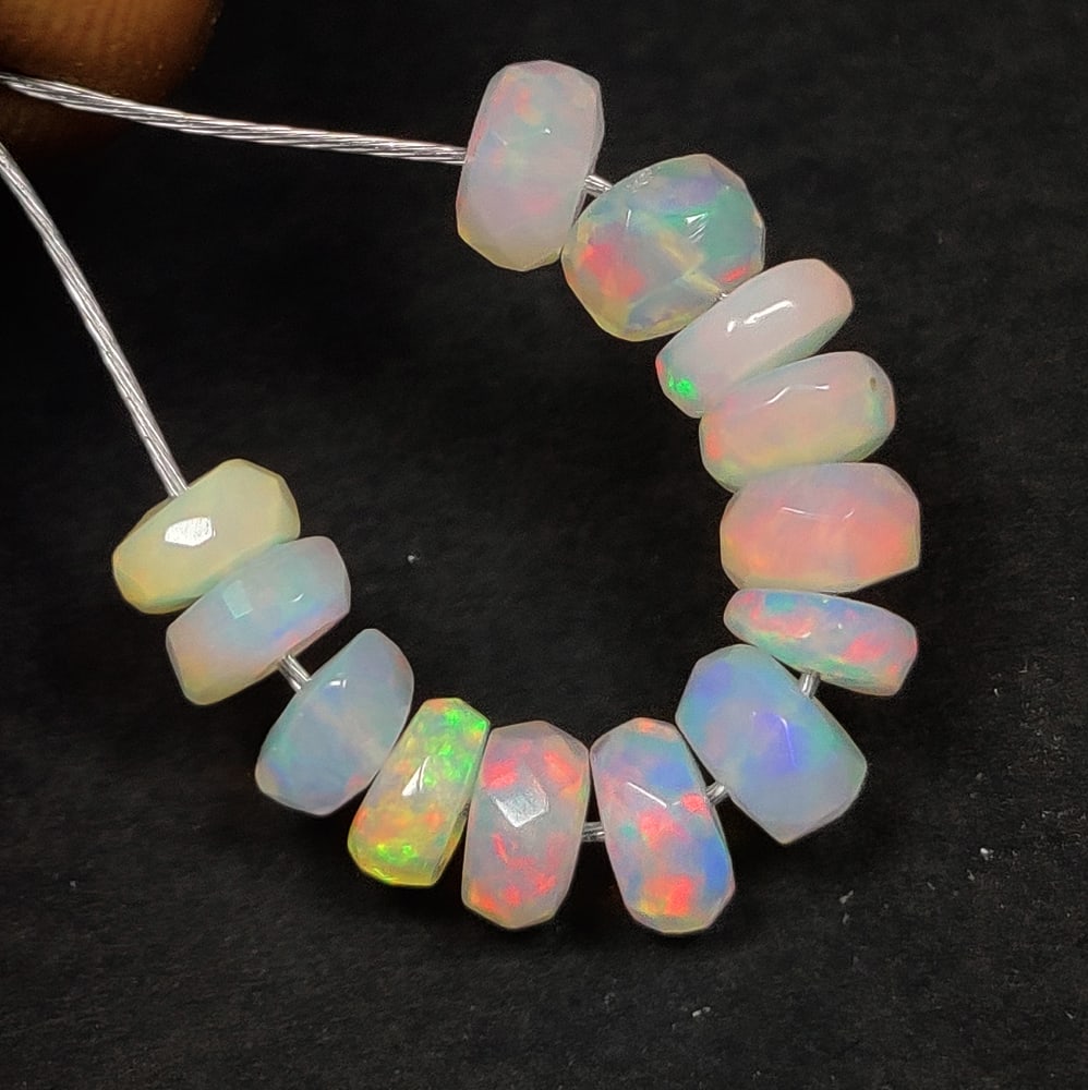 4.05 Ct Natural Multicolor Welo Opal Round Beads: Weight - 4.05 Ct / Size -4.50 - 5.00 mm / 13 Pc's / Shape - Round Beads / Color - Multicolor / Clarity - Translucent / Origin - Ethiopia / Treatment - None